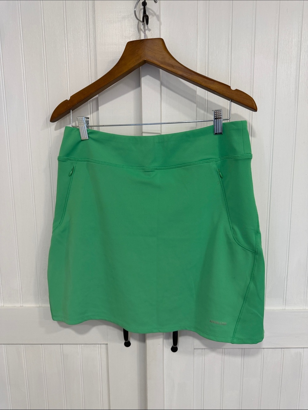 Annika Women’s Active Skort in Bright Green. Multi pockets size L